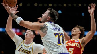 Sluggish Lakers trounced by short-handed Hawks to end winning streak