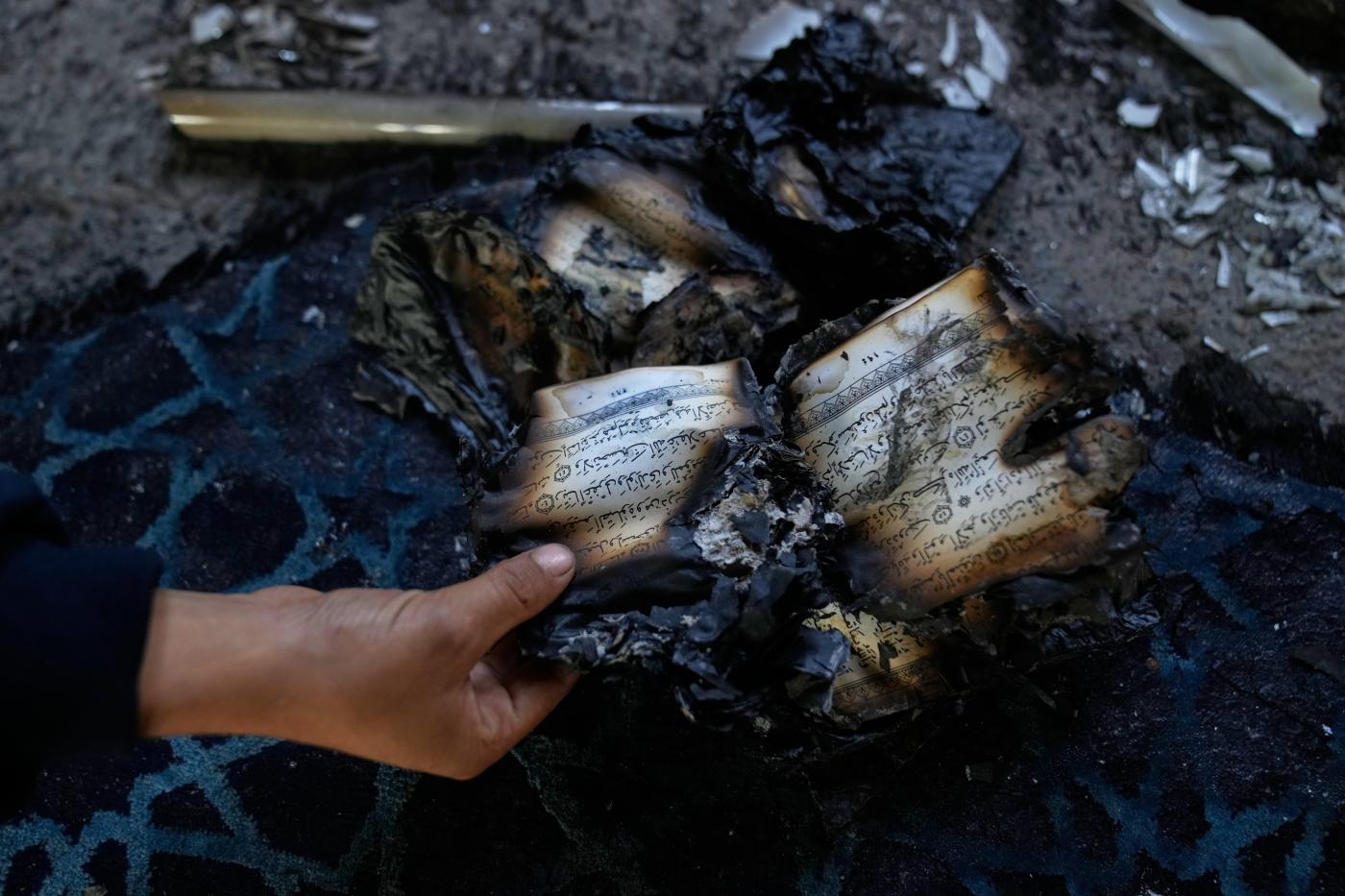 Israeli settlers torch a mosque and scrawl hateful messages after condemnation from military leaders