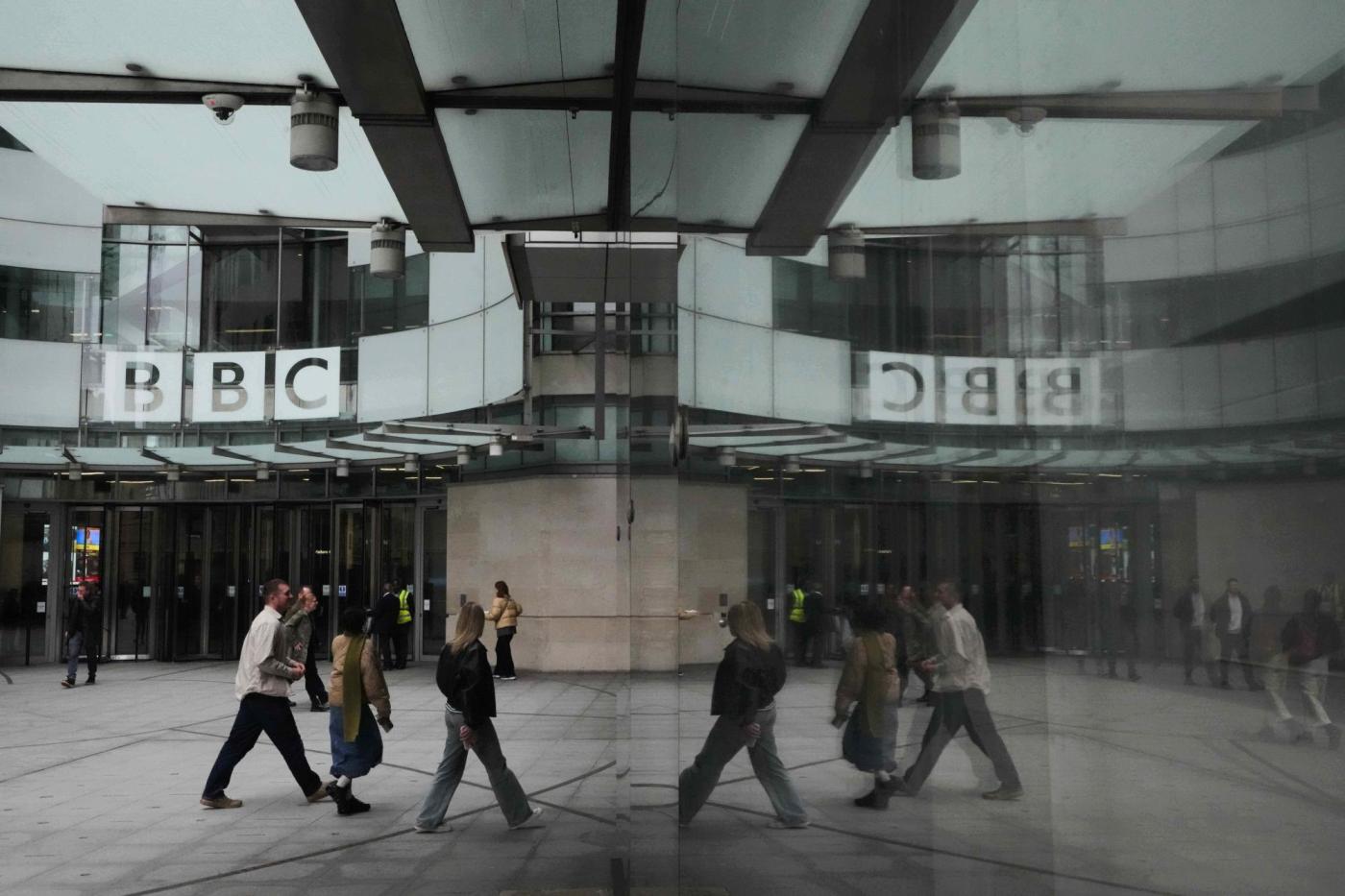 BBC leaders grilled by lawmakers over its standards after Trump threatened to sue