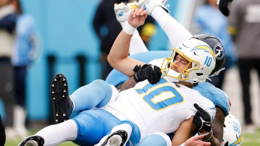 Chargers QB Justin Herbert keeps taking hits – and late ones