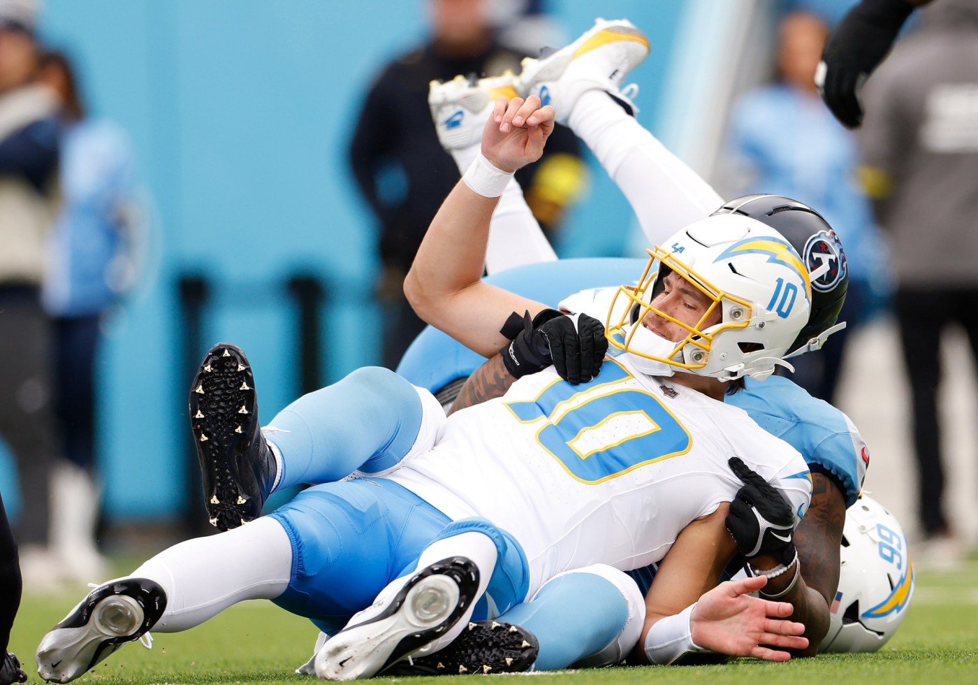 Chargers QB Justin Herbert keeps taking hits – and late ones