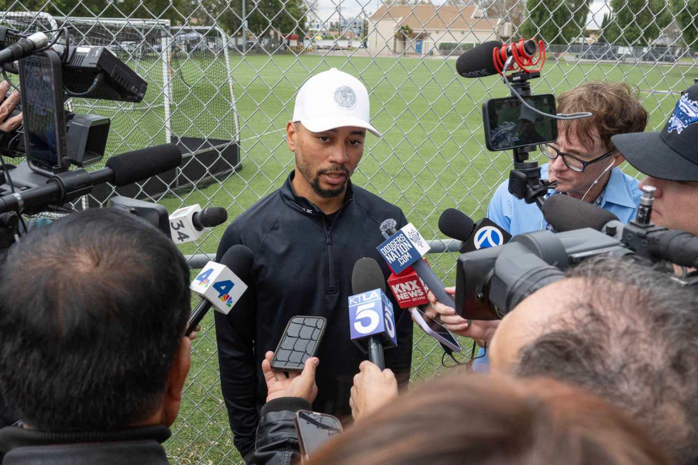 Mookie Betts, his wife Brianna, and family joined volunteers giving turkeys to 750 families