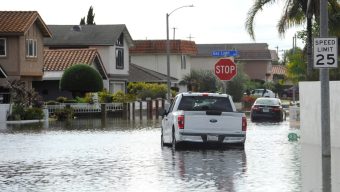 Flash floods, multiple rescues and 1 killed by a falling tree as storm rattles OC, LA