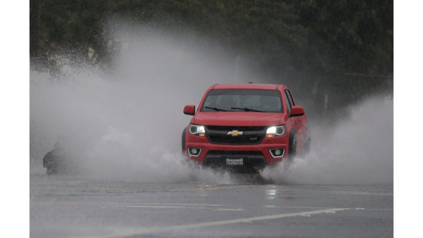 Evacuation warnings issued in LA city and county burn scar areas as rainstorm approaches
