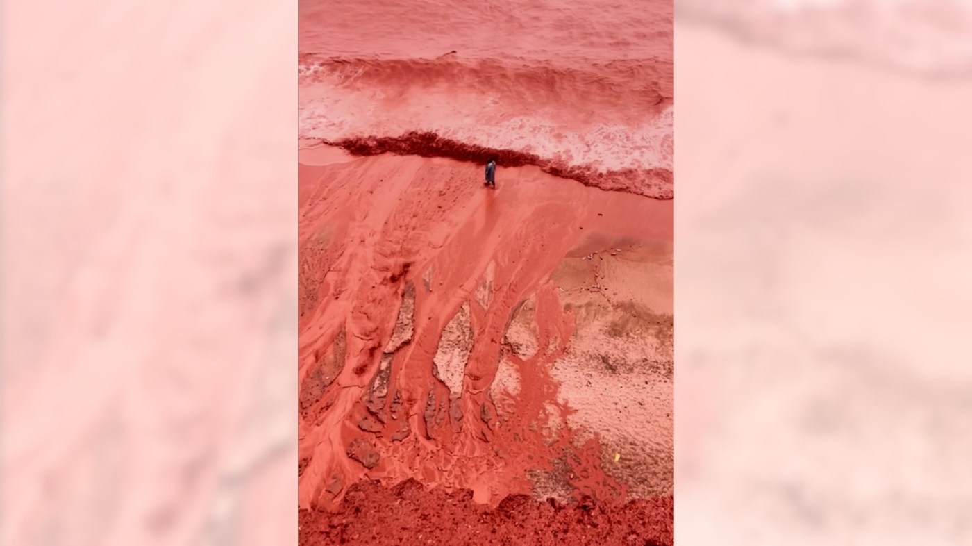 Rain creates a crimson spectacle on Iran’s Hormuz Island for the first time this year