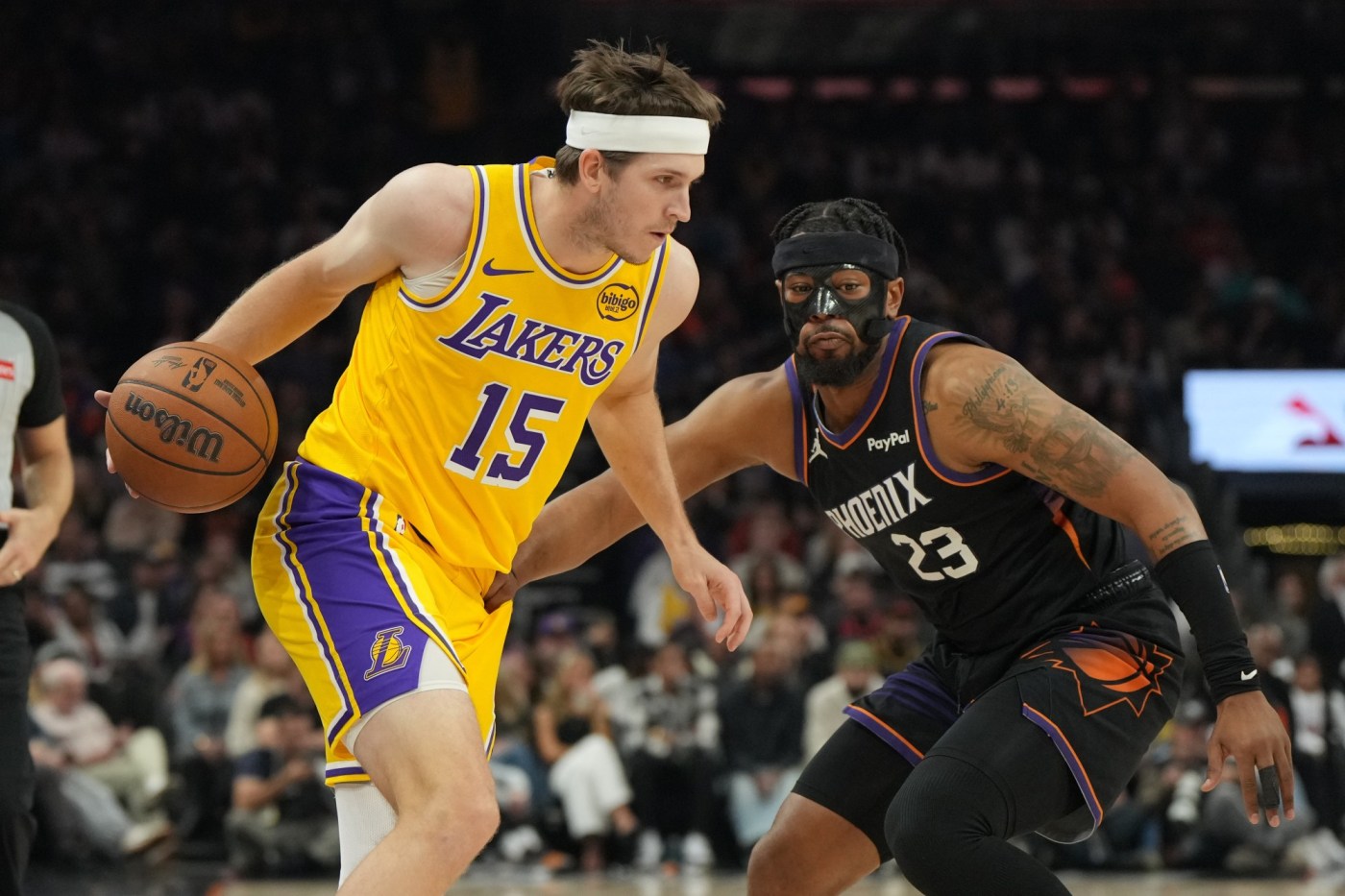 Lakers’ Austin Reaves returns from calf injury, comes off bench against Suns
