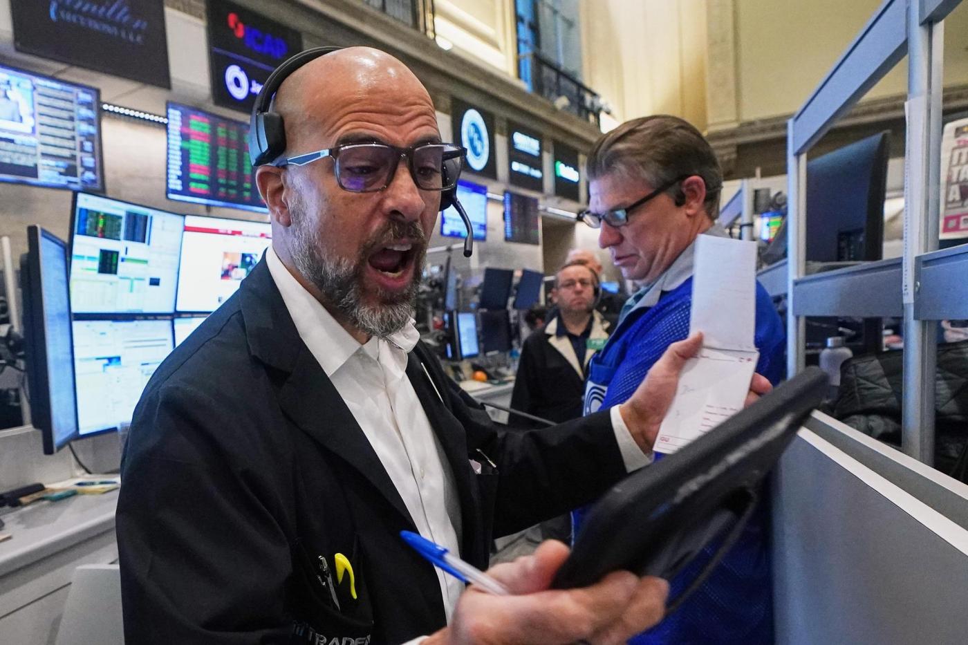 Crypto stocks help pull Wall Street lower and threaten its 5-day winning streak