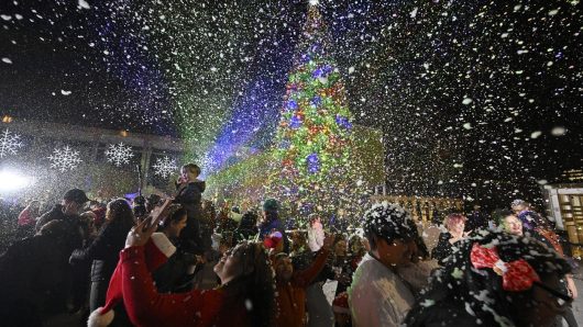 A tradition since 1948, LA County Christmas tree lighting draws crowd to Music Center