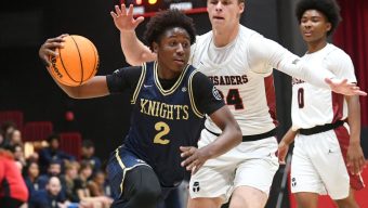 Notre Dame boys basketball sends message with rout of Village Christian