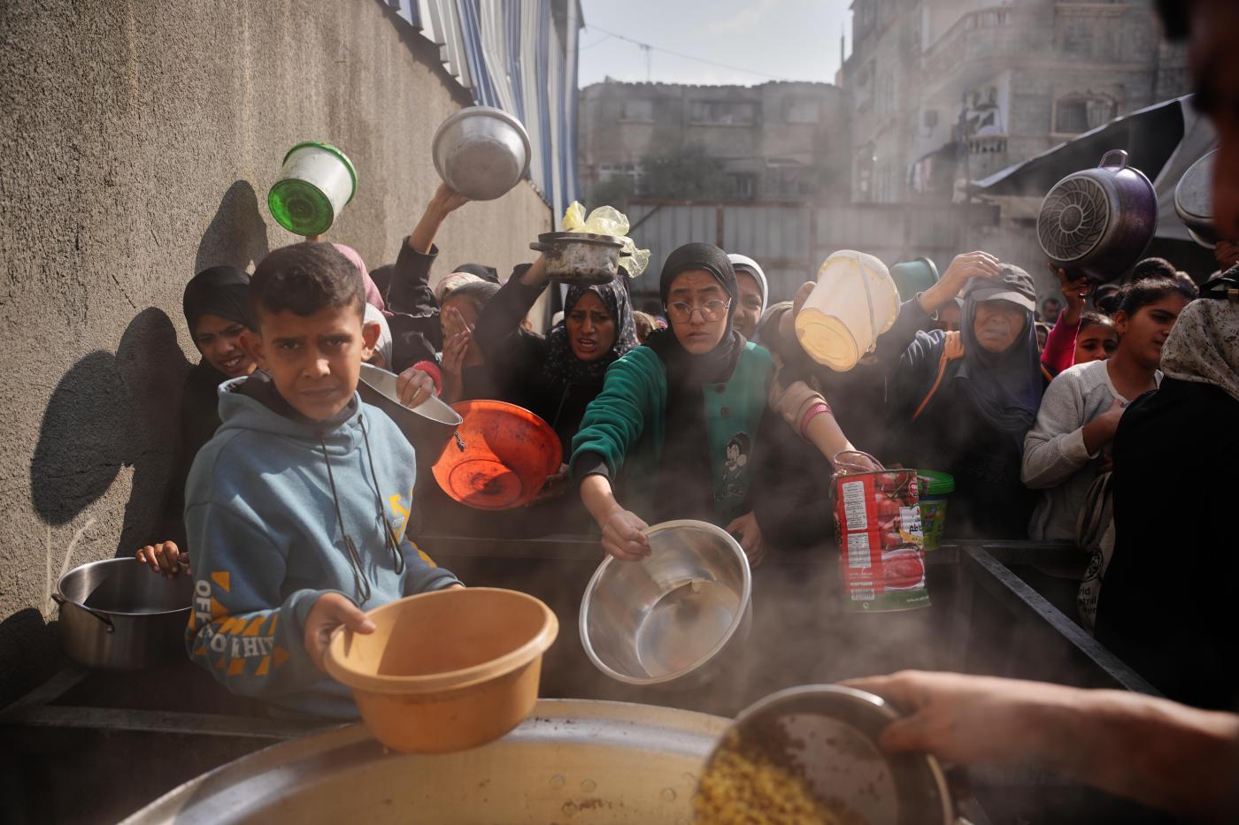 Spread of famine in Gaza Strip averted but Palestinians there still face starvation, experts say