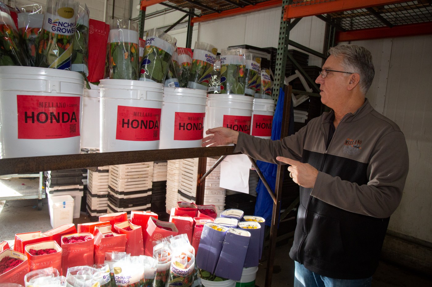 A century-old LA business helps bring Rose Parade floats their floral finesse