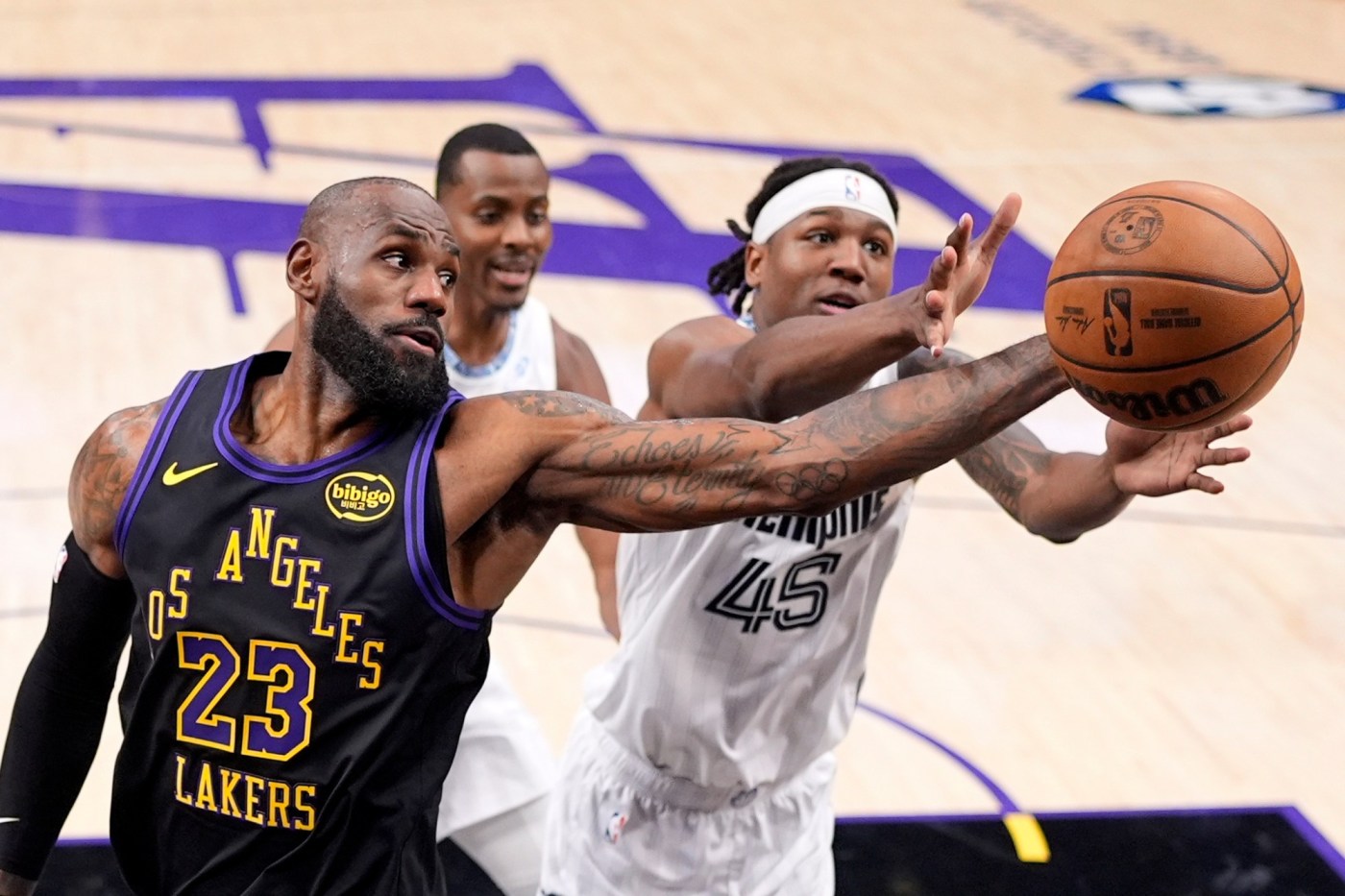 Luka Doncic, LeBron James lead Lakers past Grizzlies to kick off 2026