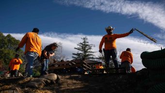 In Altadena, immigrant workers, volunteers clean up soil for future community garden
