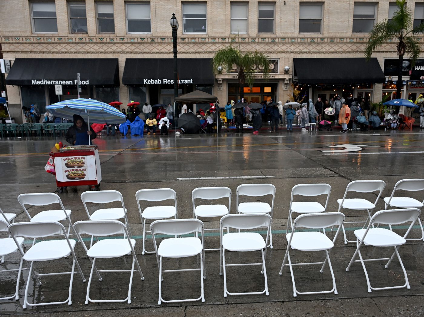 Rain-soaked Rose Parade sees drop in attendance