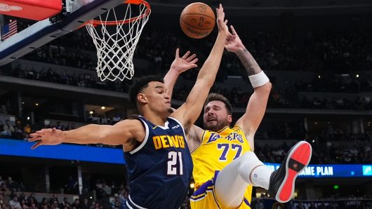 Luka Doncic has triple-double as Lakers surge past depleted Nuggets